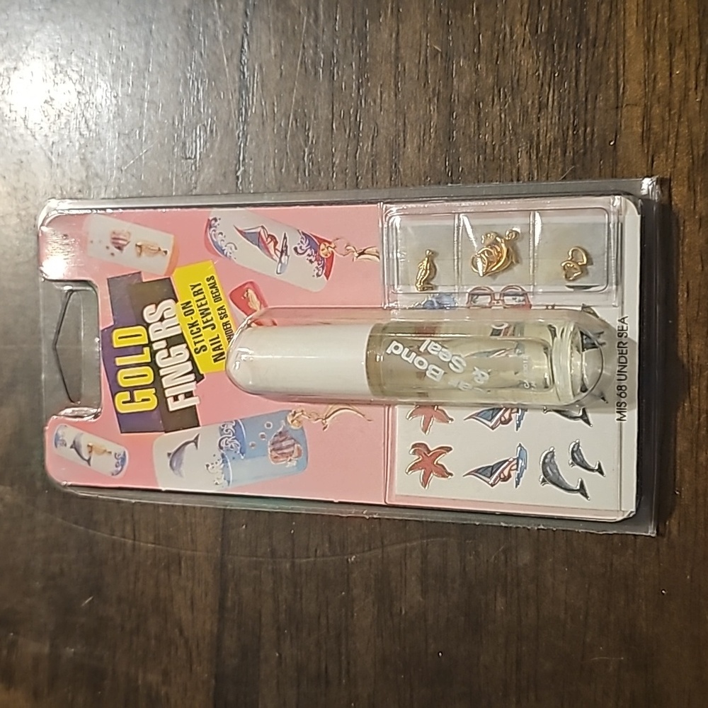 Nail jewelry and decals with sealer